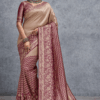 Elegant beige and wine color Banarasi silk saree with intricate zari floral border and zigzag woven pattern, paired with a wine blouse, perfect for wedding, festive and traditional