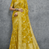 Elegant mustard yellow Banarasi silk saree with intricate floral zari weaving and rich traditional border, perfect for wedding, festive and party wear occasions.