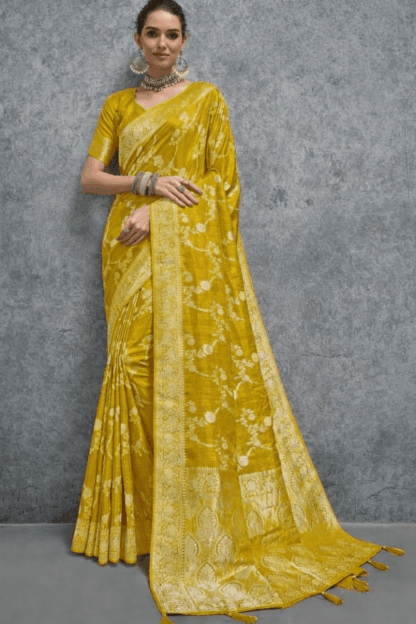Elegant mustard yellow Banarasi silk saree with intricate floral zari weaving and rich traditional border, perfect for wedding, festive and party wear occasions.