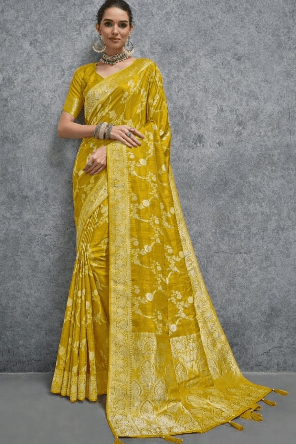 Elegant mustard yellow Banarasi silk saree with intricate floral zari weaving and rich traditional border, perfect for wedding, festive and party wear occasions.