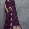 Elegant wine purple Banarasi silk saree with intricate golden zari woven motifs and rich traditional border, perfect for wedding, festive and party wear occasions.